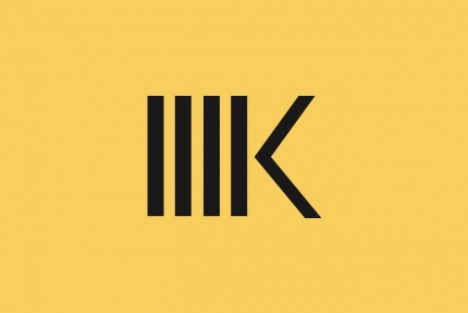 Karnov Group Yellow Background Symbol